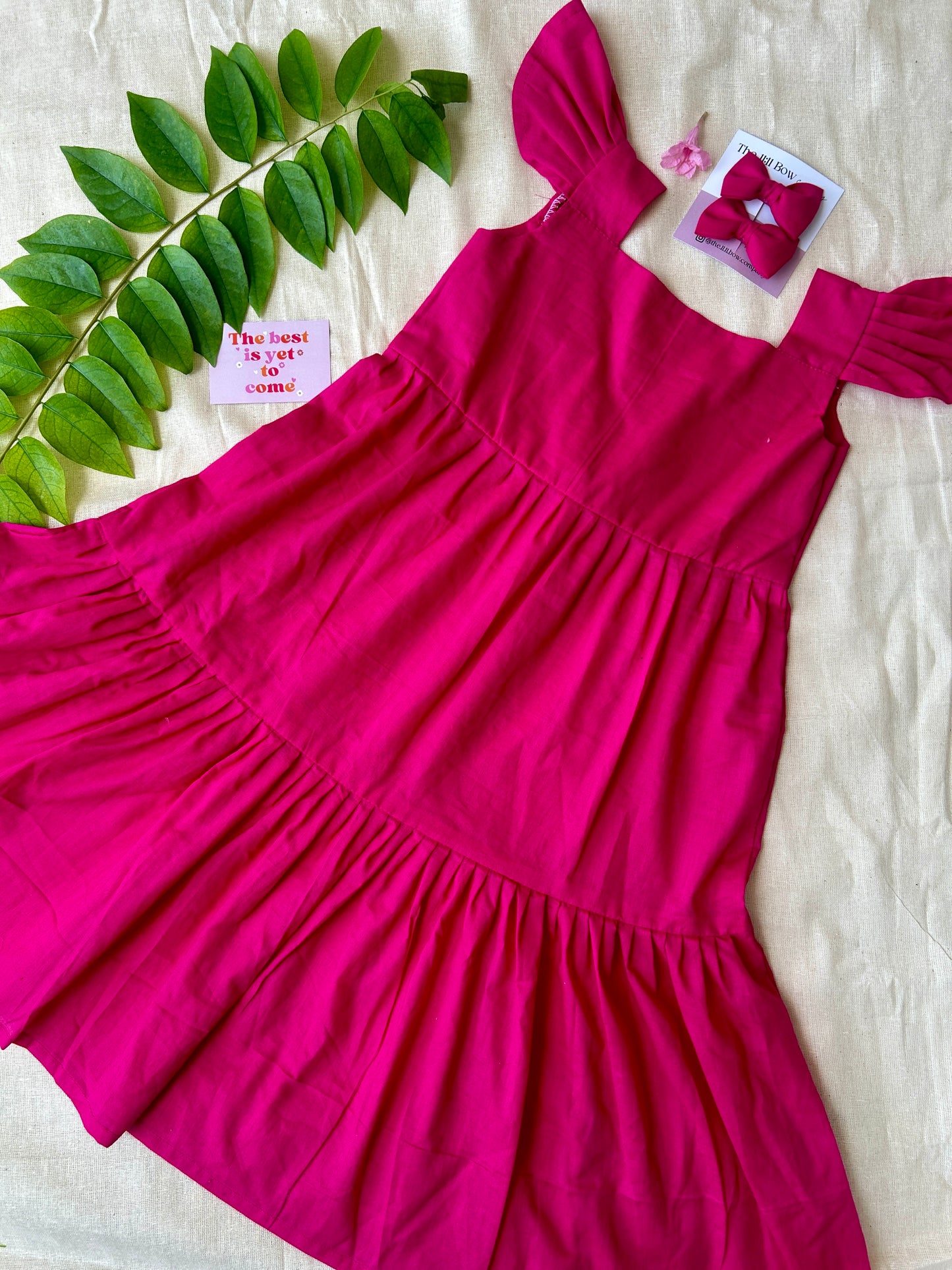 #A# 001D - Barbie pink layered frock with pink bows.