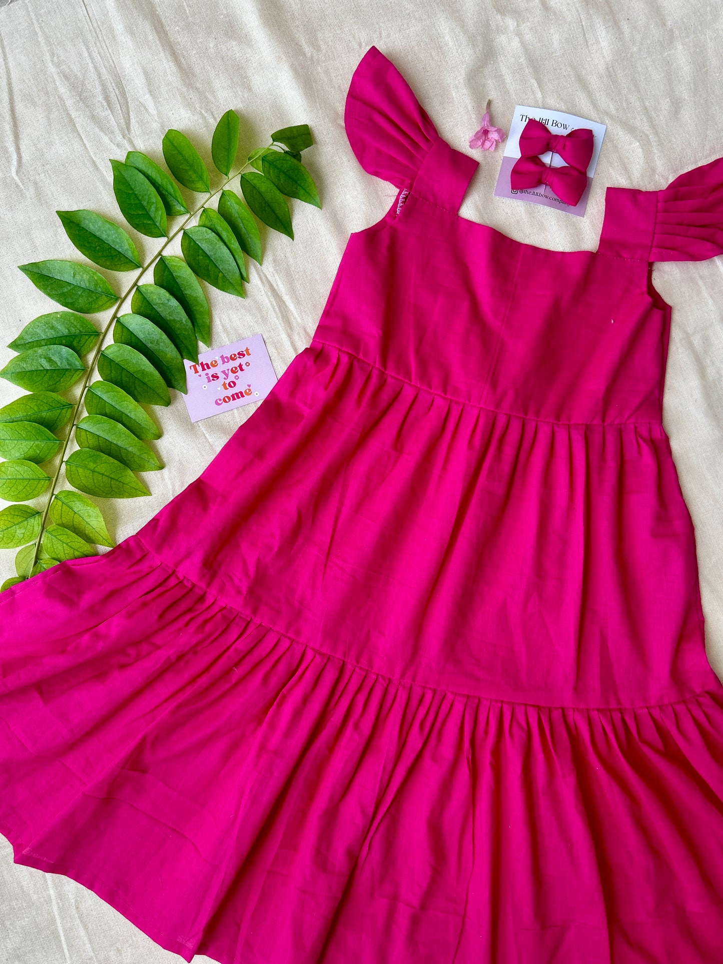#A# 001D - Barbie pink layered frock with pink bows.